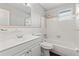 Clean bathroom with a shower/tub combo and white tile at 22 Morning Star Ave, Ormond Beach, FL 32176