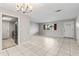 Open floor plan living room with kitchen and dining area views at 22 Morning Star Ave, Ormond Beach, FL 32176