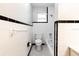Simple bathroom with white tile and a tub/shower combo at 22 Morning Star Ave, Ormond Beach, FL 32176