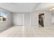 Bright living room with tile floors and an open floor plan at 22 Morning Star Ave, Ormond Beach, FL 32176