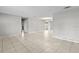 Living room with tile floors and access to other rooms at 22 Morning Star Ave, Ormond Beach, FL 32176