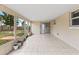 Bright screened porch overlooking the backyard at 22 Morning Star Ave, Ormond Beach, FL 32176