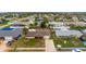 An aerial view of a single Gathering home with a large yard at 22 Morning Star Ave, Ormond Beach, FL 32176