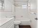 Updated bathroom with a tub and dark wood floors at 22 Morning Star Ave, Ormond Beach, FL 32176