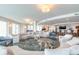 Spacious & elegant common area with comfortable seating, a large TV, and a wet bar at 3703 S Atlantic Ave # 501, Daytona Beach Shores, FL 32118