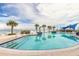 Resort-style pool with ocean views and dolphin statues at 3703 S Atlantic Ave # 501, Daytona Beach Shores, FL 32118