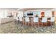 Curved bar in the community room with comfortable seating for residents at 3703 S Atlantic Ave # 501, Daytona Beach Shores, FL 32118