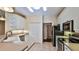 Bright kitchen featuring white cabinets, stainless steel appliances, and tile backsplash at 3709 Donegal Cir, Ormond Beach, FL 32174