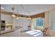 Well-equipped kitchen with white cabinets and breakfast nook at 3709 Donegal Cir, Ormond Beach, FL 32174