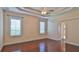 Large bedroom with hardwood floors, plantation shutters, and ceiling fan at 3709 Donegal Cir, Ormond Beach, FL 32174