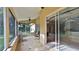 Relaxing screened porch with tile floor and seating at 3709 Donegal Cir, Ormond Beach, FL 32174