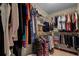 Large walk-in closet with shelving and hanging rods at 980 Bluebird Ter, Deltona, FL 32725