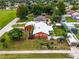 Aerial view of single Gathering home with lush landscaping at 980 Bluebird Ter, Deltona, FL 32725
