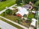 Aerial view of single Gathering home with lush landscaping at 980 Bluebird Ter, Deltona, FL 32725