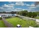 Spacious backyard with grassy lawn and wooden fence at 2100 Brian Ave, South Daytona, FL 32119