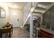 Inviting entryway with staircase, storage, and a small workspace at 2100 Brian Ave, South Daytona, FL 32119