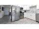 Modern kitchen with stainless steel appliances and white cabinets at 2100 Brian Ave, South Daytona, FL 32119