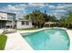 Inviting pool and spa area with plenty of patio space for relaxation at 2100 Brian Ave, South Daytona, FL 32119