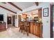 Spacious kitchen with wood cabinets and a breakfast bar at 573 Pelican Bay Dr, Daytona Beach, FL 32119