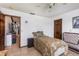 Small bedroom with twin-size bed and dresser at 573 Pelican Bay Dr, Daytona Beach, FL 32119