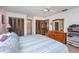 Large bedroom with king-size bed and dresser at 573 Pelican Bay Dr, Daytona Beach, FL 32119