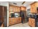 Kitchen boasts wood cabinets, stainless steel appliances at 573 Pelican Bay Dr, Daytona Beach, FL 32119