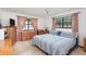 Bedroom with king-size bed and large windows at 573 Pelican Bay Dr, Daytona Beach, FL 32119