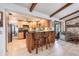 Kitchen features wood cabinets, granite counters, and breakfast bar at 573 Pelican Bay Dr, Daytona Beach, FL 32119