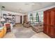 Spacious living room with hardwood floors, ceiling fan and ample natural light at 573 Pelican Bay Dr, Daytona Beach, FL 32119