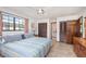 Spacious bedroom with king-size bed and ceiling fan at 573 Pelican Bay Dr, Daytona Beach, FL 32119