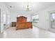 Large bedroom with wood furniture and access to a balcony at 2291 Henry Ln, Deltona, FL 32738
