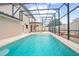 Inviting swimming pool with screened enclosure at 2291 Henry Ln, Deltona, FL 32738