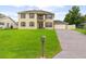 Two-story house, large lawn, driveway, and mailbox at 2291 Henry Ln, Deltona, FL 32738