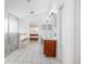 Main bathroom boasts a double vanity, a large shower, and a separate bathtub at 2291 Henry Ln, Deltona, FL 32738