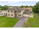 Two-story house with driveway and landscaping at 2291 Henry Ln, Deltona, FL 32738