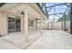 Covered patio with ceiling fan and screened enclosure at 2291 Henry Ln, Deltona, FL 32738