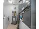 Laundry room includes a washer, dryer, water heater, and HVAC unit at 2291 Henry Ln, Deltona, FL 32738