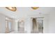 Bright entryway with a view of the staircase and tiled floors at 2291 Henry Ln, Deltona, FL 32738