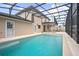 Refreshing swimming pool with screened enclosure at 2291 Henry Ln, Deltona, FL 32738