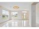 Large living room with lots of natural light and tiled floors at 2291 Henry Ln, Deltona, FL 32738