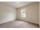 Spacious bedroom with neutral walls and carpeted floor at 1631 Primo Ct, Holly Hill, FL 32117