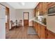Classic kitchen with wood cabinets and a breakfast nook at 1402 Talton Ave, Deland, FL 32720