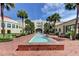 Rectangular fountain in a courtyard with palm trees at 1402 Talton Ave, Deland, FL 32720