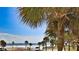 Stunning view of the ocean from balcony, with palm trees in foreground at 935 S Atlantic Ave # 206, Daytona Beach, FL 32118