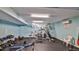 Well-equipped fitness center featuring weight machines and free weights at 935 S Atlantic Ave # 206, Daytona Beach, FL 32118