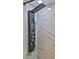 Modern shower with marble tile and a multi-function shower head at 935 S Atlantic Ave # 206, Daytona Beach, FL 32118
