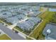 Community overview showcasing a variety of homes and a lake at 623 Margaritaville Ave, Daytona Beach, FL 32124