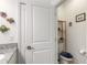 Small half bathroom with toilet and shelving at 623 Margaritaville Ave, Daytona Beach, FL 32124