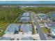 Aerial view of a neighborhood with houses and streets at 623 Margaritaville Ave, Daytona Beach, FL 32124