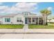 Charming two-story home with front porch and landscaping at 623 Margaritaville Ave, Daytona Beach, FL 32124